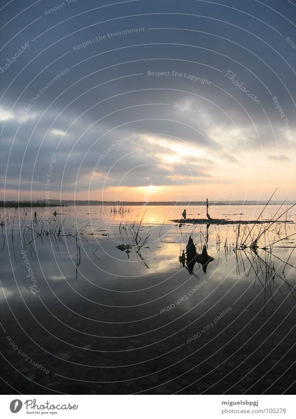 Warm twilight landscape on a beautifull cloudy sky Himmel Frieden lagoon blue water serenity