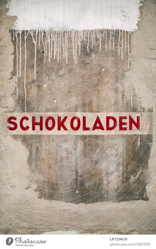 Fonstantin´s SCHOKOLADEN Schokolade Mauer Wand Beton Schriftzeichen retro Stadt schokoladen Farbe Straßenkunst Ladengeschäft Farbfoto Außenaufnahme Menschenleer