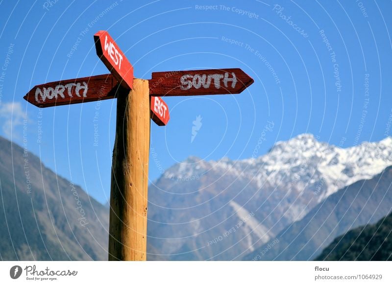 Signpost with directions in the mountains Ferien & Urlaub & Reisen Sommer Post Horizont journey trip east house path himalayas way road south west north compass