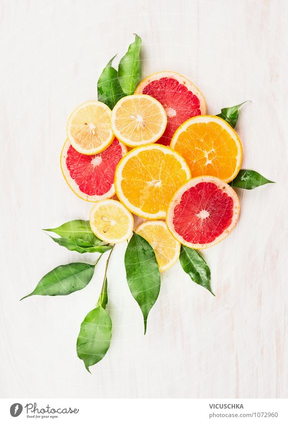 Orangen,Zintone und Grapefruit in Scheiben geschnitten Lebensmittel Frucht Dessert Ernährung Stil Design Gesunde Ernährung sportlich Fitness Tisch Küche Natur