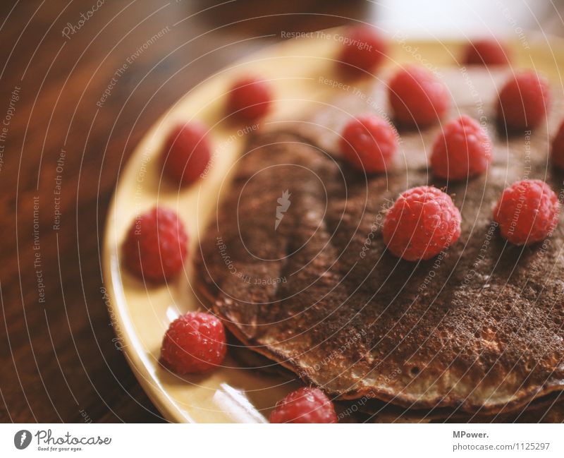 eierkuchen Lebensmittel Ernährung Essen Frühstück Vegetarische Ernährung gut Pfannkuchen Himbeeren lecker Gesundheit Gesunde Ernährung süß Farbfoto Nahaufnahme