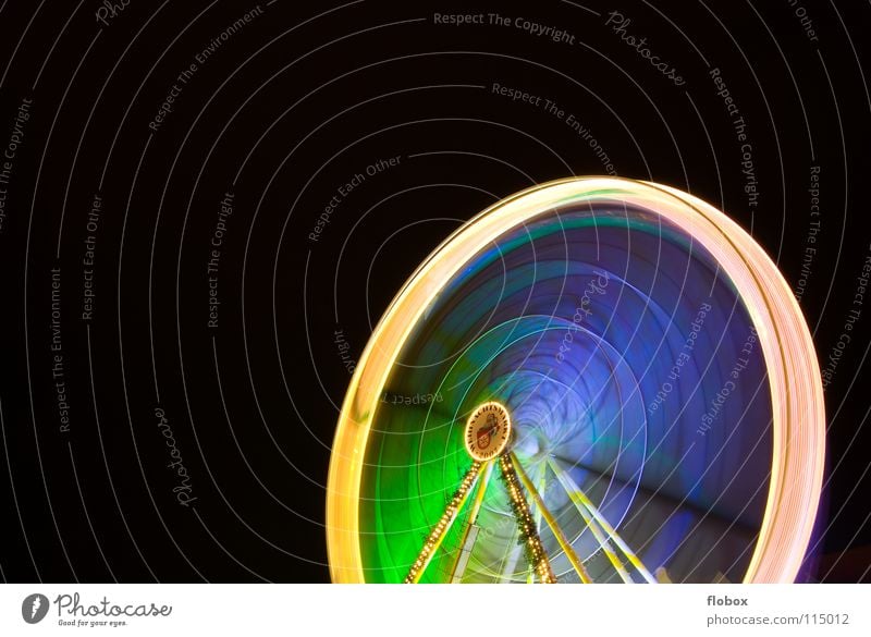 Ferris Wheel Riesenrad Karussell drehen mehrfarbig Nacht Jahrmarkt Attraktion Wahrzeichen Weihnachtsmarkt Fahrgeschäfte Schausteller Stahl rund groß Licht