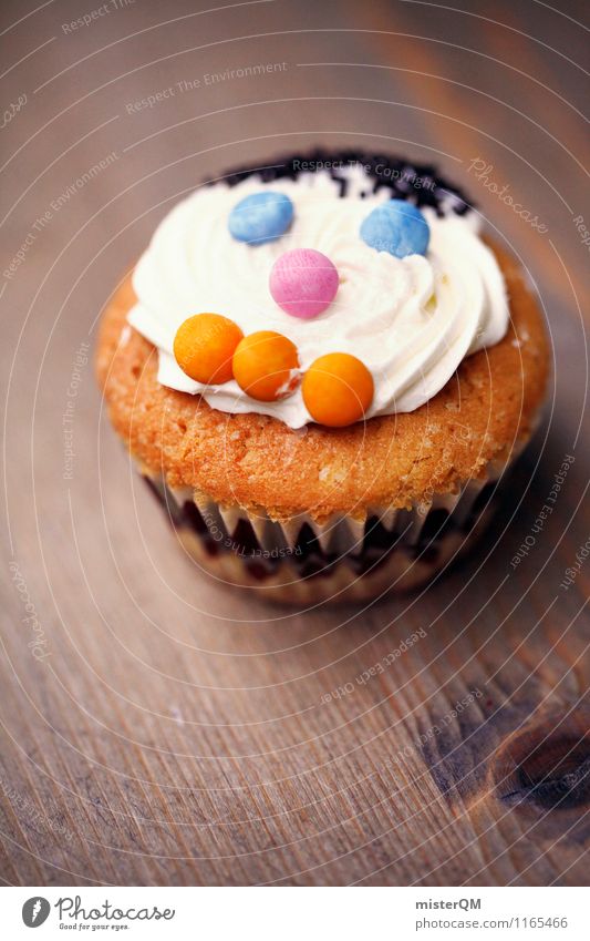 Muffin Mann II Lebensmittel Dessert Süßwaren Kunst ästhetisch Backwaren Gesicht schön süß Süßstoff lecker Kalorienreich Farbfoto Gedeckte Farben mehrfarbig