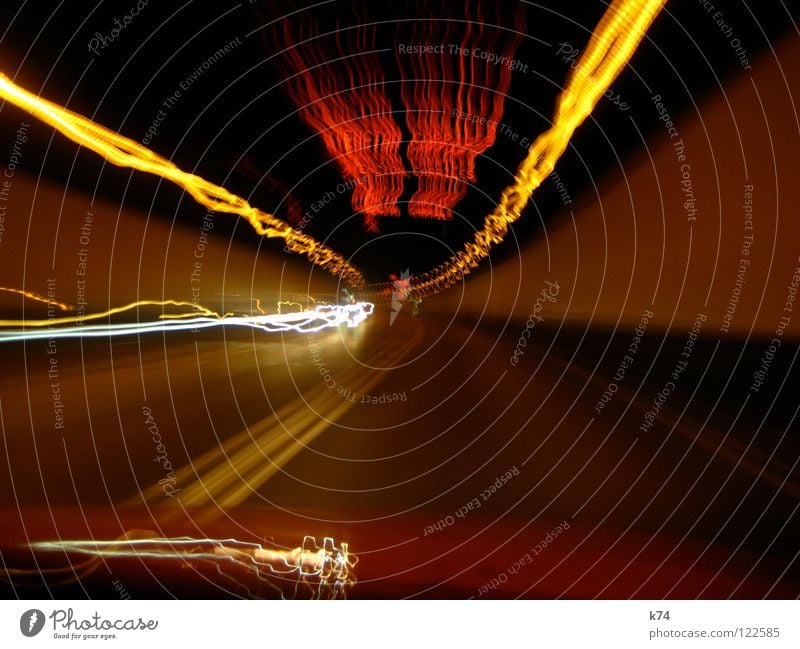 Strangers In The Light Tunnel Licht Lichtspiel Belichtung fahren Autobahn rot gelb Fluchtpunkt Geschwindigkeit Kunstlicht Fahrbahn Leuchtspur brennen Zeit Nacht