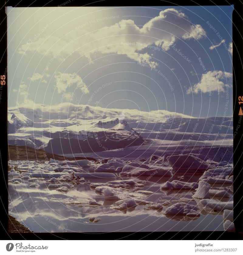 Island Umwelt Natur Landschaft Urelemente Wasser Himmel Wolken Klima Klimawandel Wetter Schönes Wetter Eis Frost Gletscher Seeufer Fjallsarlon außergewöhnlich