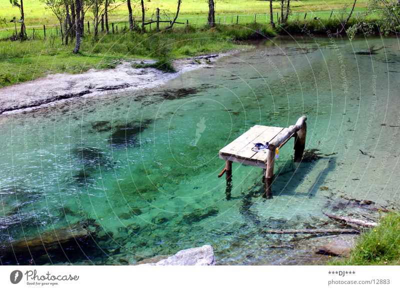 Wasserliege See grün Gras Holz Erholung Ferien & Urlaub & Reisen Fluss Bank Berge u. Gebirge Stein liegen