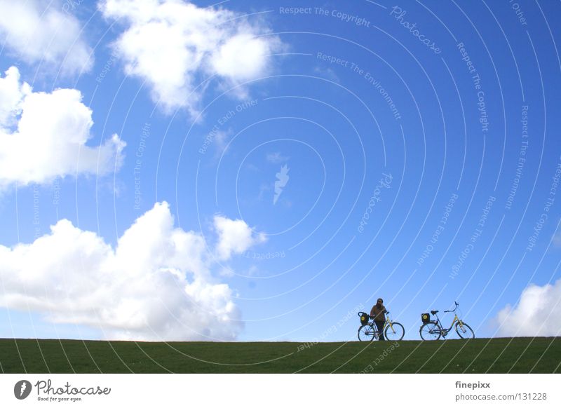 Himmlischer Radweg Langeoog Hochwasser Sturm Ebbe Deich Küste Physik grün Gras Wiese Alm Fahrrad Ferien & Urlaub & Reisen Wolken weiß Watte Wolle