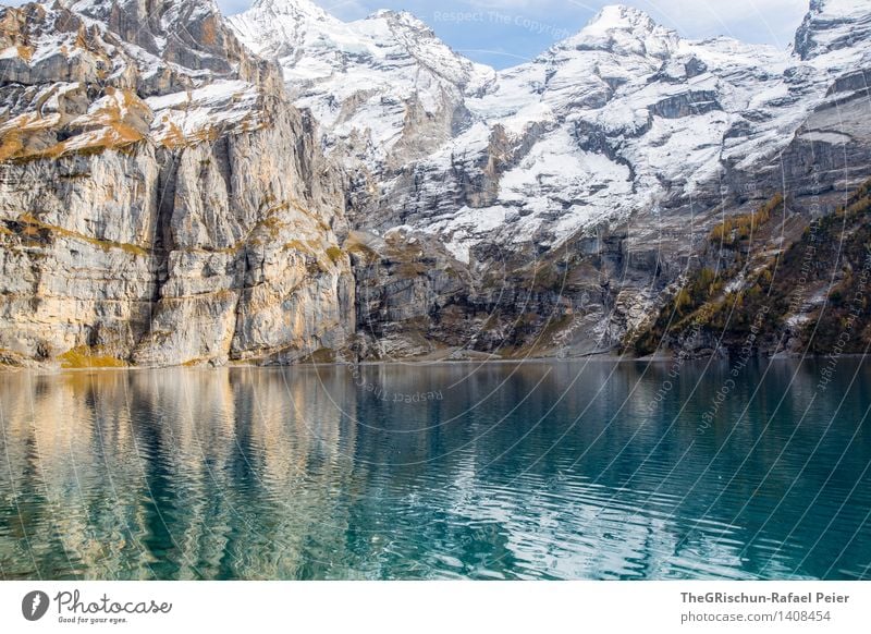 Gebirge Umwelt Natur blau braun gelb grau grün schwarz silber türkis weiß Berge u. Gebirge Wasser See Oeschinensee Schweiz Felsen Stein Schneebedeckte Gipfel