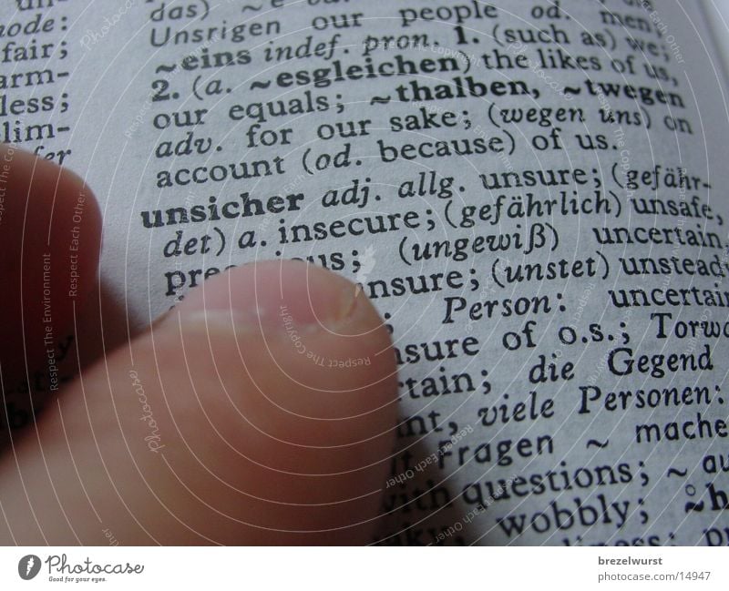 Unsicher unsicher Lexikon Buch Finger Hand Nachschlagen