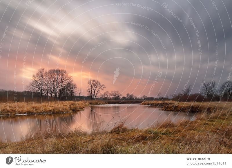 Warmer Winter. Sonnenuntergang mit Wolke Landschaft Himmel Wolken Sonnenaufgang Wind Regen Baum Gras Sträucher Wiese Wald Flussufer Skyline gelb grau rosa rot