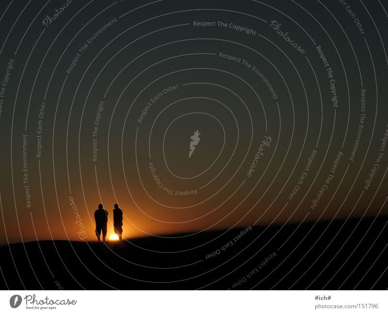 Sonnenkinder II Südafrika Kapstadt Strand Sonnenuntergang Meer Wasser 2 Mann Schatten Schattenspiel Himmel schwarz blau dunkel Einsamkeit