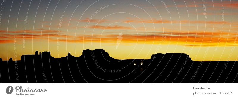 Wie Lucky Luke... Sonnenuntergang Himmel Wolken Ferien & Urlaub & Reisen Reisefotografie Silhouette unterwegs Fernweh Wohnmobil Amerika Horizont schwarz rot