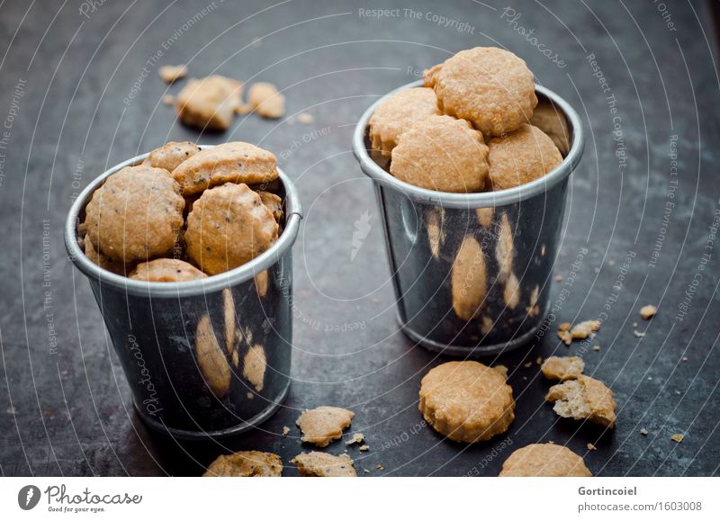 Käsecracker Lebensmittel Teigwaren Backwaren Ernährung Vegetarische Ernährung Slowfood Fingerfood lecker Snack Käsegebäck Keks Essen Knabbereien Mohn Farbfoto