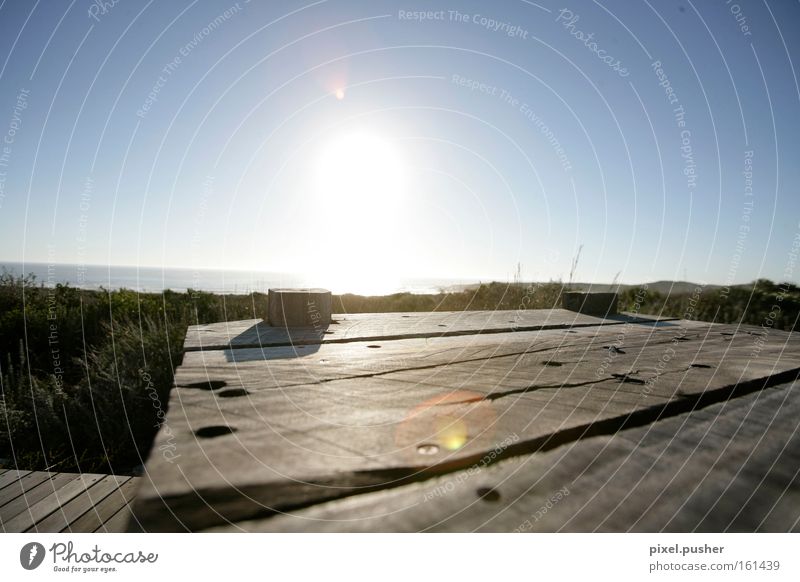 Sundown in South Africa Steg Sonne Sonnenuntergang blau hell-blau Wasser Strand Holz Afrika