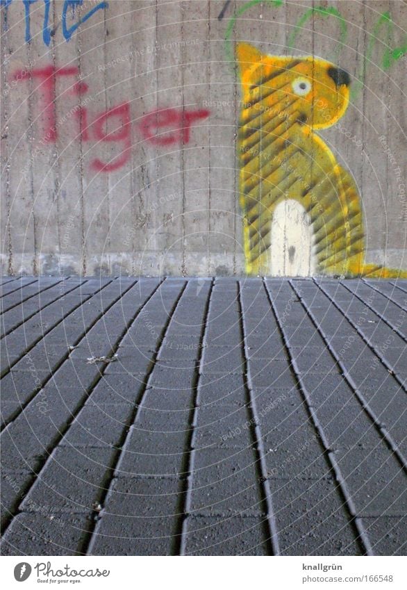 Tiger Farbfoto Außenaufnahme Menschenleer Textfreiraum unten Tag Graffiti Mauer Wand Stein Beton Schriftzeichen blau gelb grau rot schwarz weiß Freude