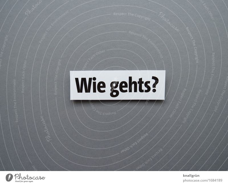 Wie gehts? Schriftzeichen Schilder & Markierungen Kommunizieren eckig Neugier Klischee grau schwarz weiß Gefühle Sympathie Mitgefühl Freundlichkeit Interesse