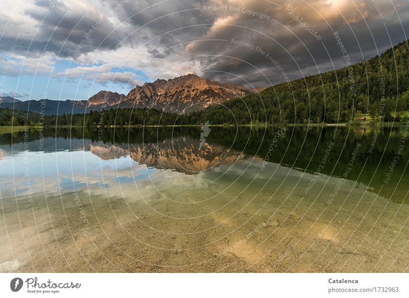 Schon bald. Spiegelungen im klaren Bergsee Schwimmen & Baden Angeln Ferien & Urlaub & Reisen Berge u. Gebirge Natur Landschaft Wasser Gewitterwolken Horizont