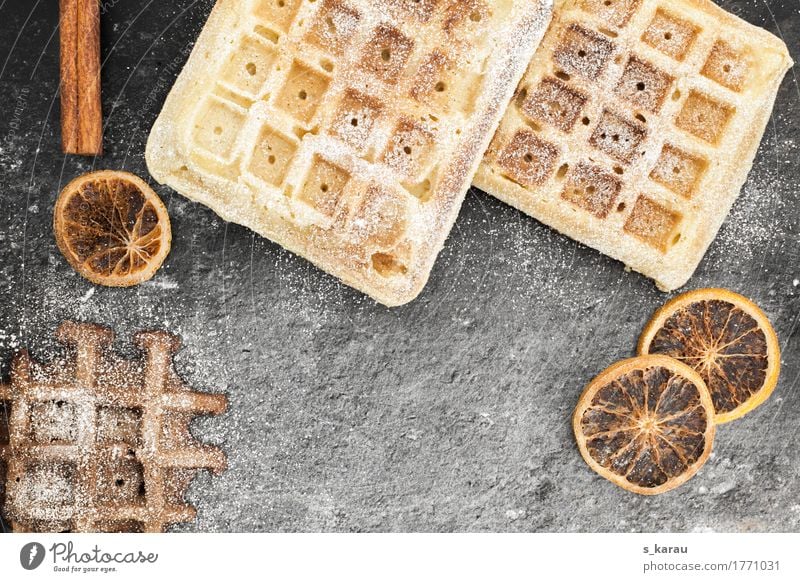 Winterwaffeln Lebensmittel Teigwaren Backwaren Kuchen Dessert Süßwaren Kaffeetrinken Duft süß braun grau genießen Waffel Schokolade Vanille Zimt Orange backen