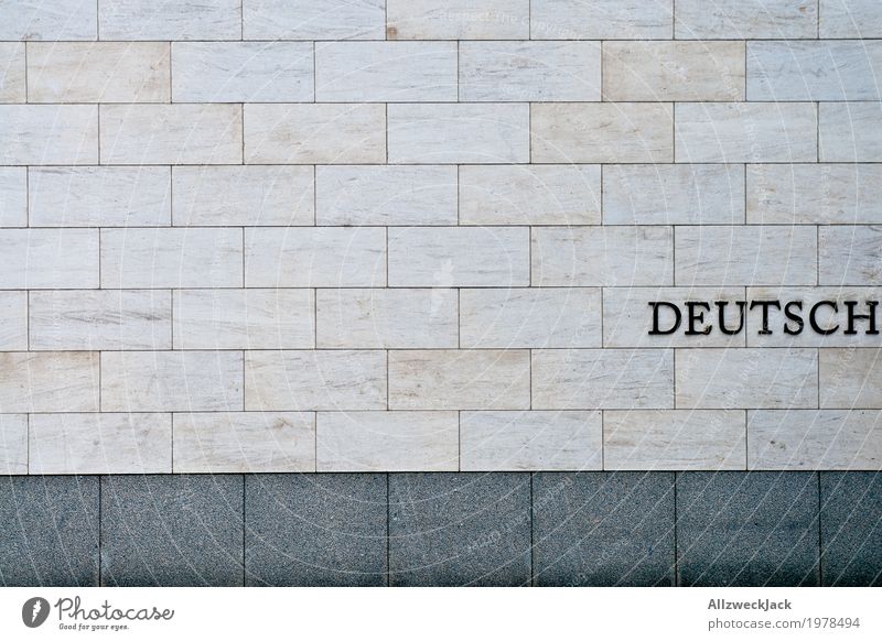 Deutsch Architektur Mauer Wand Fassade Schriftzeichen grau Deutschland Typographie Buchstaben Nationalitäten u. Ethnien Farbfoto Außenaufnahme Menschenleer Tag