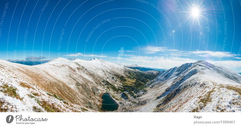 Panorama auf schöner Berglandschaft mit blauem See Ferien & Urlaub & Reisen Tourismus Ausflug Abenteuer Sonne Winter Schnee Winterurlaub Berge u. Gebirge Umwelt