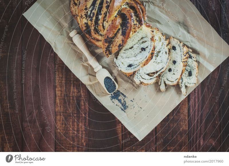 Gebackenes Gebäck mit Mohn Lebensmittel Brötchen Dessert Kräuter & Gewürze Ernährung Löffel Holz Essen frisch natürlich braun schwarz Haufen süß organisch