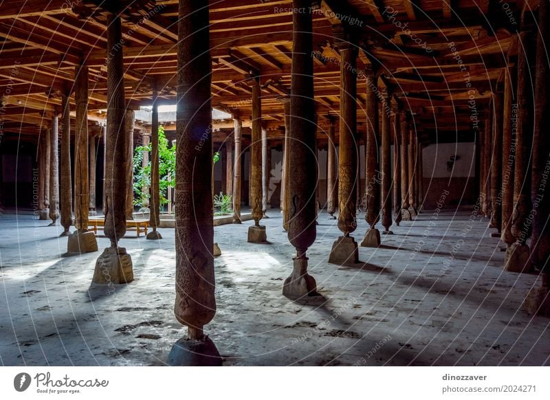 Geschnitzte hölzerne Säulen in Madrassa, Khiva Design Tourismus Sonne Dekoration & Verzierung Kunst Kultur Kirche Gebäude Architektur Holz Ornament alt