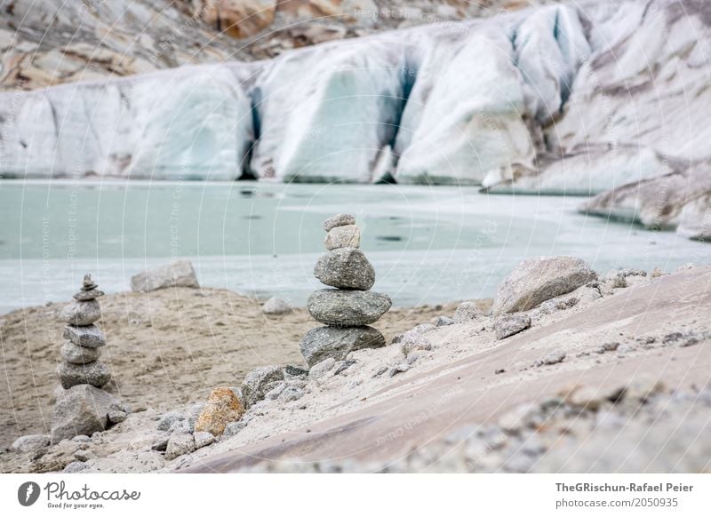 steinmännchen Natur blau braun grau schwarz silber weiß Steinmännchen Außenaufnahme Gletscher Rhone Gletscher Schweiz Sand See Gletschereis Eis Farbfoto