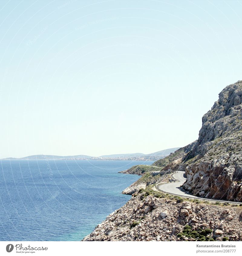 Kurven mit Abgang Himmel Wolkenloser Himmel Horizont Sonnenlicht Sommer Schönes Wetter Wärme Felsen Küste Insel Chios Griechenland Europa Verkehrswege heiß hell