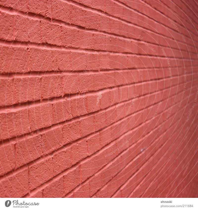 Stein auf Stein Maurerhandwerk Baustelle Haus Bauwerk Architektur Mauer Wand Fassade stark rot Schutz Sicherheit Backstein Farbfoto Außenaufnahme Muster