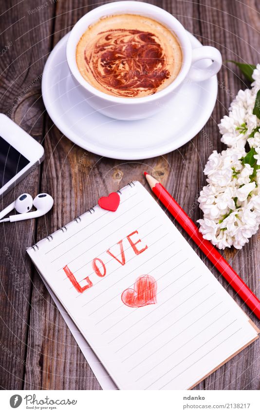 Notizblock in einer Linie mit einer Inschrift Frühstück Kaffeetrinken Heißgetränk Becher PDA Blume Holz Herz Blühend Liebe grau rot weiß Notebook Tasse