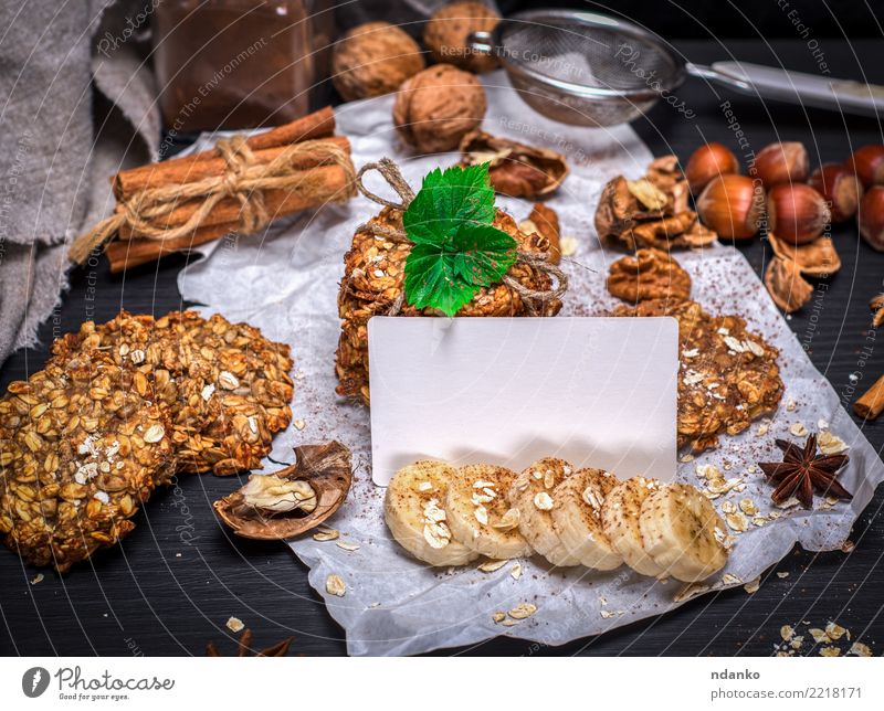 Ookies aus Haferflocken Dessert Ernährung Frühstück Mittagessen Diät Kakao Holz braun gelb schwarz weiß Energie Tradition Attrappe Postkarte leer Vorlage