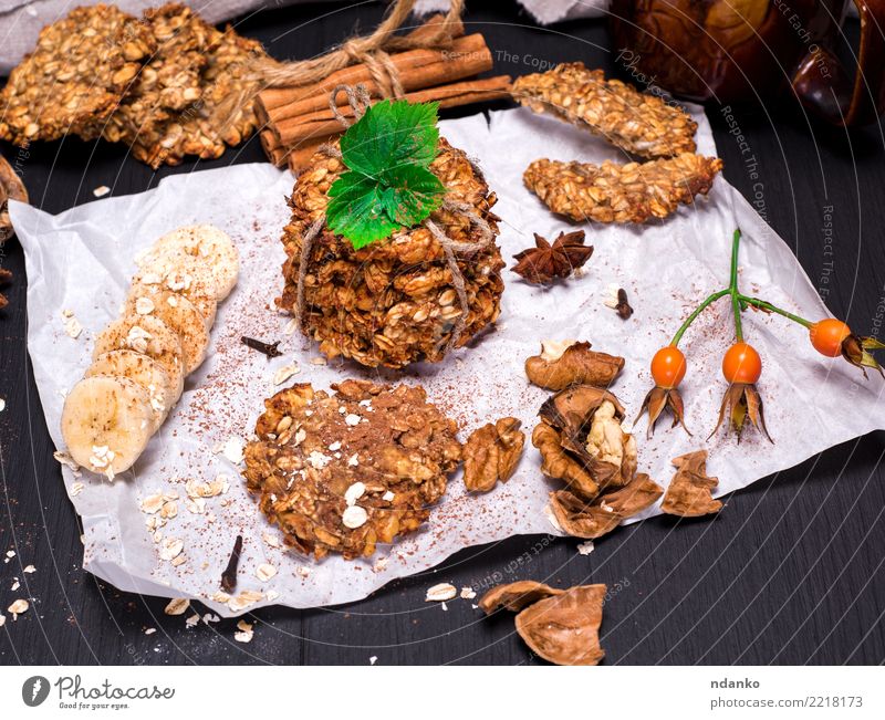 Kekse aus Haferflocken und Bananen Dessert Süßwaren Ernährung Frühstück Mittagessen Vegetarische Ernährung Diät Kakao Tisch Holz Essen lecker natürlich braun