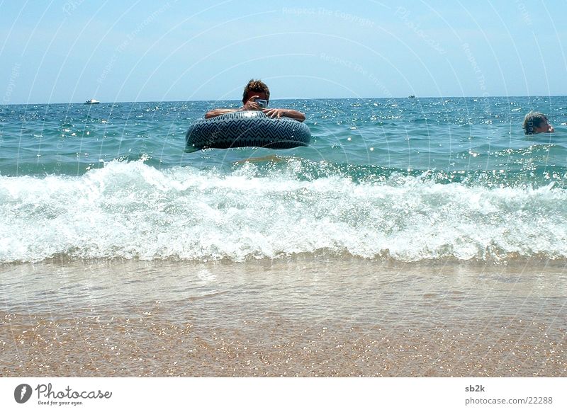 Meer Fotos Ferien & Urlaub & Reisen Fotograf Fotografieren Schwimmhilfe Mann