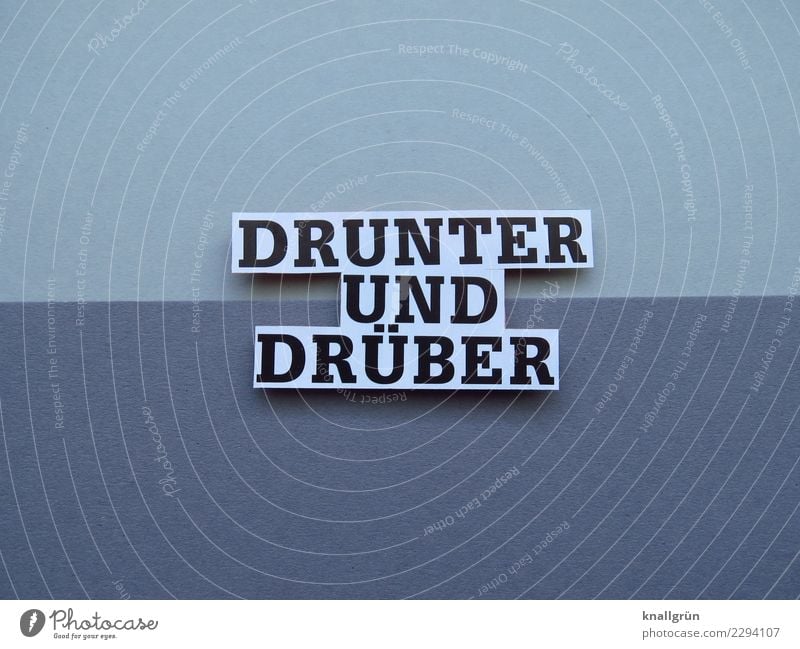 DRUNTER UND DRÜBER Schriftzeichen Schilder & Markierungen Kommunizieren eckig grau schwarz weiß Gefühle Stimmung Hemmungslosigkeit Krise Stress Irritation