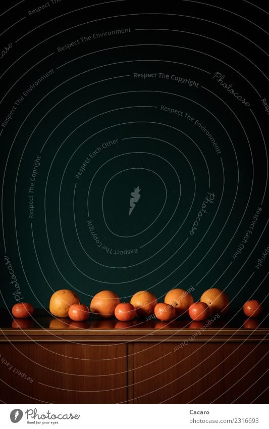 Obstaufstellung Lebensmittel Frucht Orange Mandarine Ernährung Diät Kommode exotisch frisch Gesundheit glänzend lecker rund saftig süß braun grün Ordnungsliebe