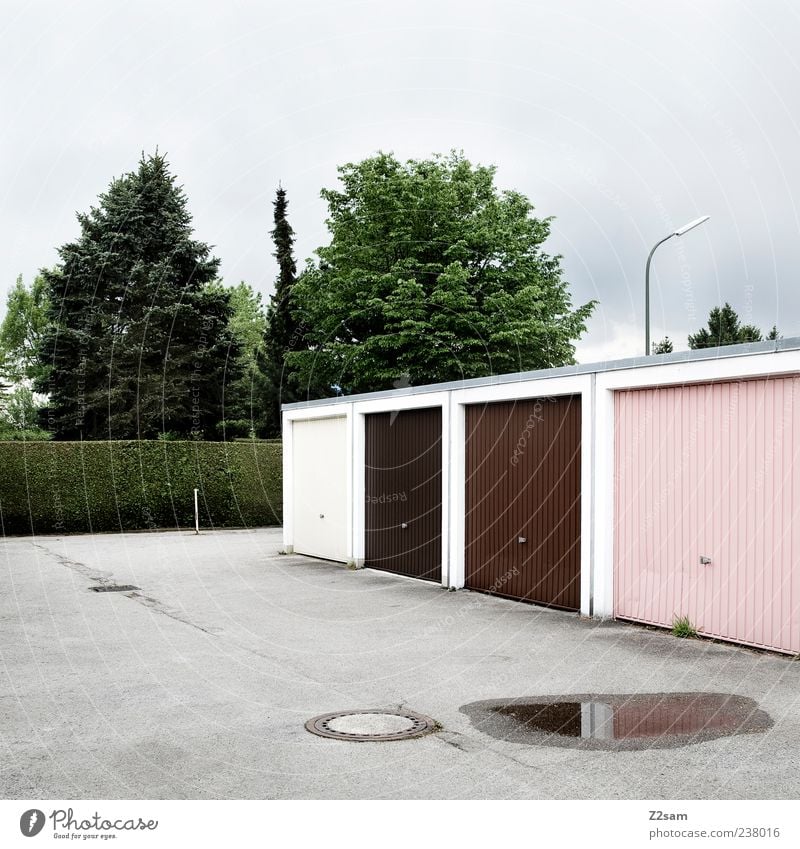 Garagengemeinschaft Stil Häusliches Leben Garagentor Dorf Bauwerk Gebäude Architektur Verkehrswege authentisch dunkel eckig einfach trist Genauigkeit