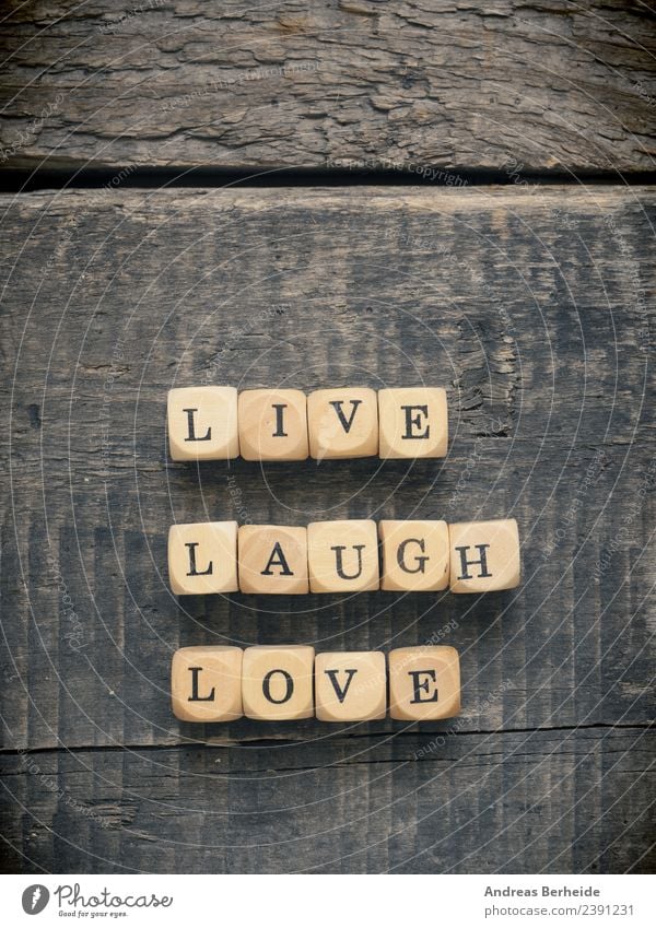 Live laugh love Leben harmonisch Liebe positiv retro Lebensfreude Kraft Inspiration abstract advice Hintergrundbild Block concept crossword cube development