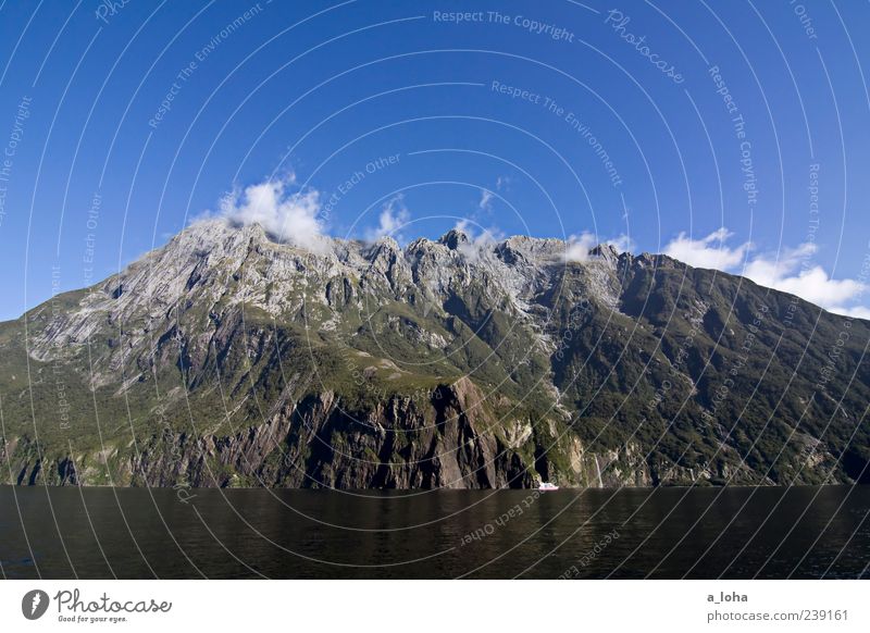 fernweh Umwelt Natur Landschaft Pflanze Urelemente Luft Wasser Himmel Wolken Herbst Klima Schönes Wetter Felsen Gipfel Küste Fjord Bekanntheit groß blau grün