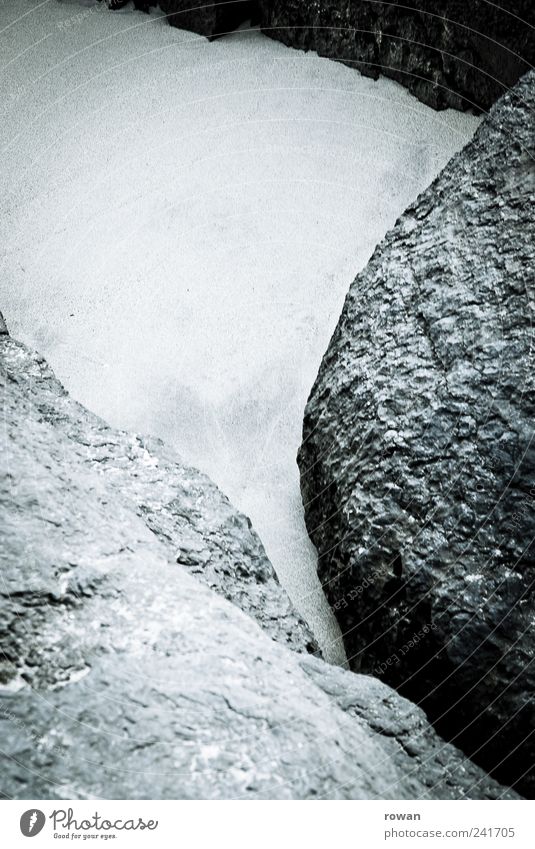 steinig Natur Landschaft Felsen Küste grau hart rund ruhig Formation Strukturen & Formen Sand Strand Stein Kontrast Schwarzweißfoto Außenaufnahme Menschenleer