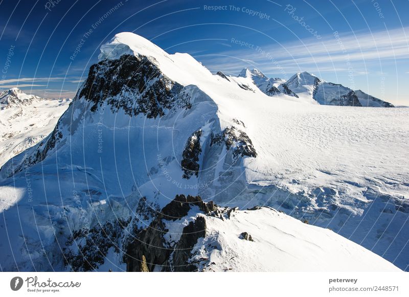 Breithorn mountain peak. View from kl. Matterhorn, Zermatt Ausflug Winter Natur Schnee Alpen Berge u. Gebirge wandern anstrengen alpin alps blue castor