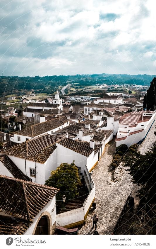 Über dem historischen Obidos Freizeit & Hobby Ferien & Urlaub & Reisen Tourismus Ausflug Sightseeing Städtereise 1 Mensch Wolken Sonne Portugal Europa Dorf