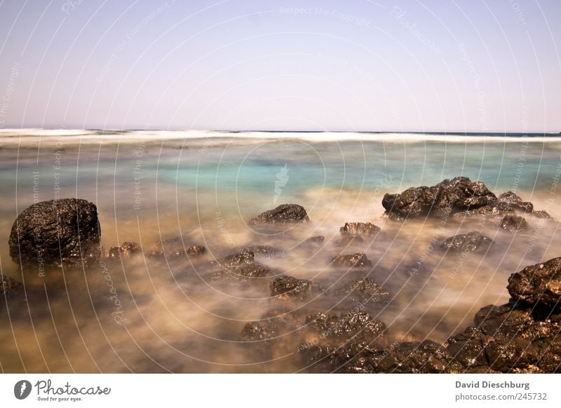 Faszination Belichtung Meer Insel Wellen Landschaft Wasser Wolkenloser Himmel Schönes Wetter Felsen Küste Bucht Riff blau braun Kreta türkis Stein ruhig