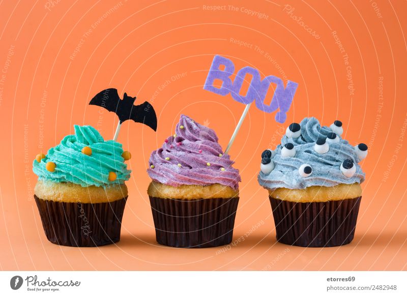 Halloween Törtchen Lebensmittel Kuchen Süßwaren Ernährung grau violett orange Cupcake süß Dessert Foodfotografie Muffin Feiertag Herbst Sahne Zucker Angst