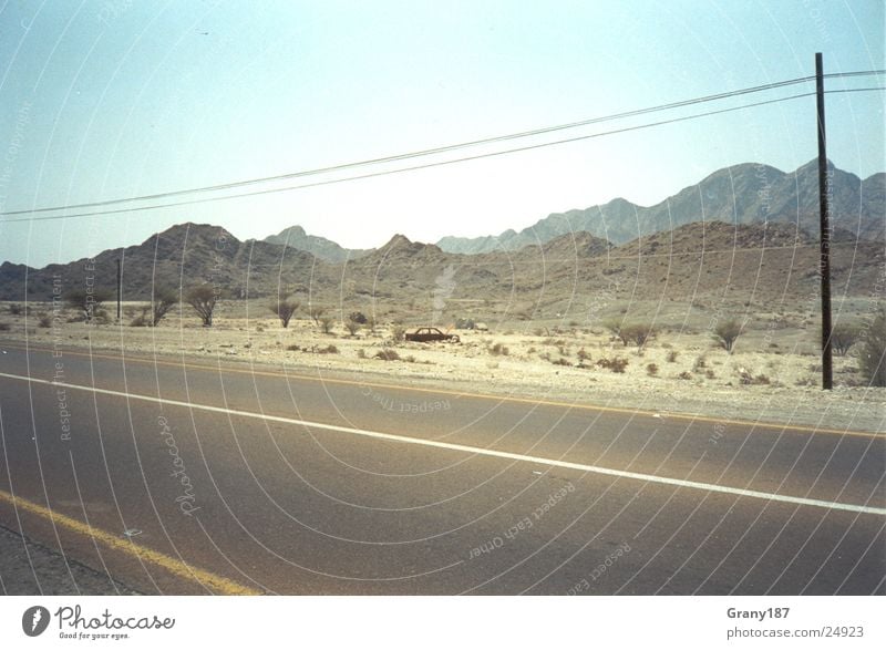 Desert Route Ödland Werbefachmann Plakat Panorama (Aussicht) Ferien & Urlaub & Reisen Autobahn Straße Wüste Sand Telgrafenmast Werbemittel Plakatwerbung