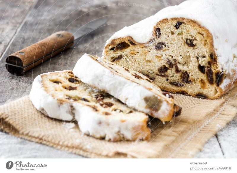 Christstollen. Lebensmittel Frucht Kuchen Dessert Süßwaren Ernährung Frühstück Mittagessen Abendessen Bioprodukte Messer Weihnachten & Advent Holz gut natürlich