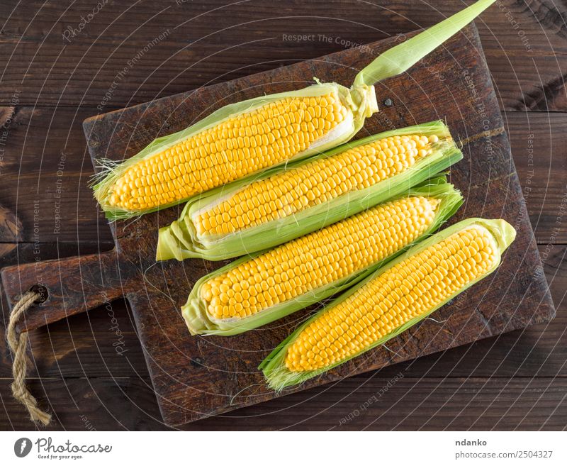 frische reife gelbe Maiskolben Gemüse Ernährung Vegetarische Ernährung Tisch Natur Pflanze Blatt Holz alt Essen natürlich oben braun Kolben Ackerbau Hintergrund