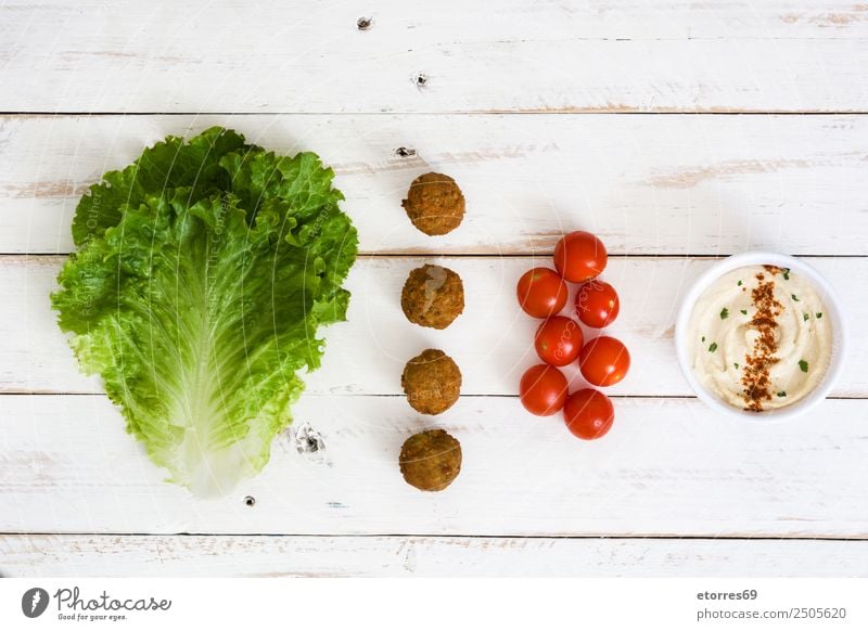 Vegetarische Falafel und Zutaten Lebensmittel Gemüse Getreide Ernährung Bioprodukte Vegetarische Ernährung Asiatische Küche gut braun grün rot Kichererbsen