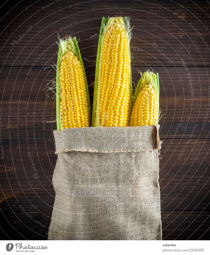 reife gelbe Maiskolben Gemüse Ernährung Vegetarische Ernährung Tisch Holz alt Essen frisch natürlich oben braun Tasche Kolben Ackerbau Hintergrund Bauernhof