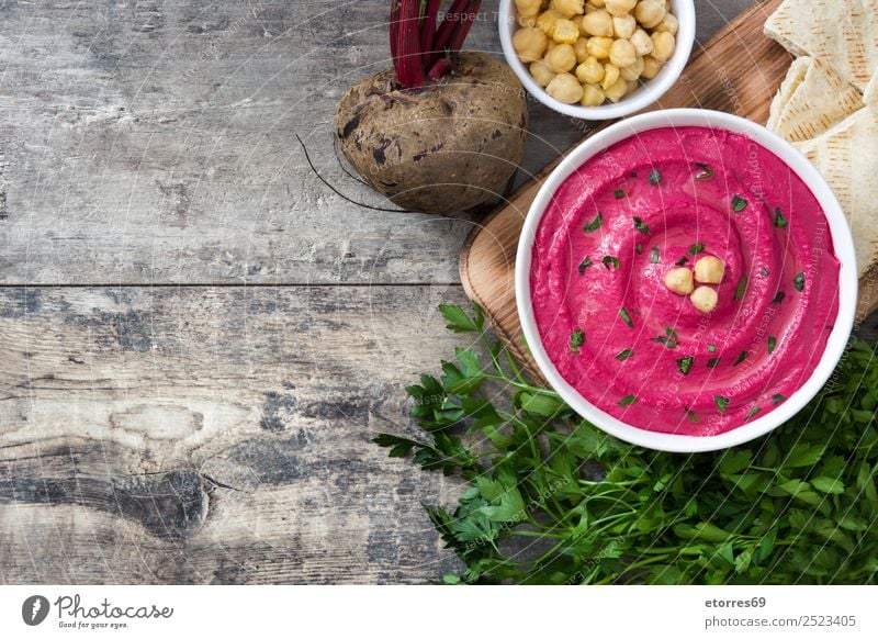 Rübenhummus Lebensmittel Brot Ernährung Vegetarische Ernährung Diät Schalen & Schüsseln Gesunde Ernährung Tisch Holz frisch Hummus Rote Beete Griechen Speise