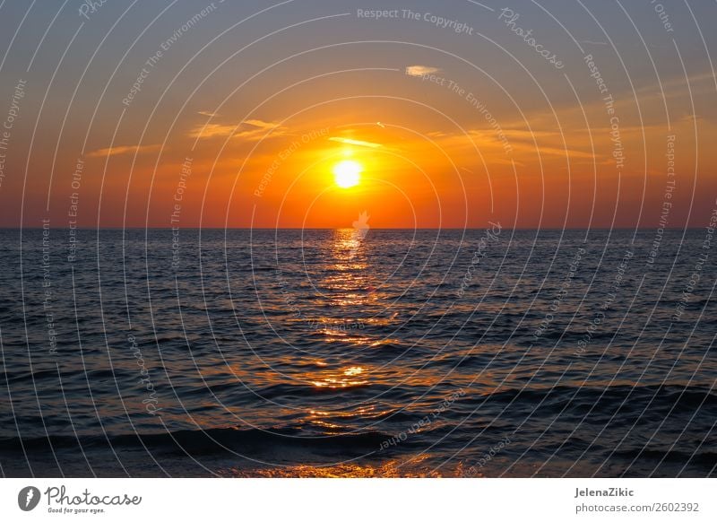 Schöner Sonnenuntergang am Meer schön Ferien & Urlaub & Reisen Sommer Strand Tapete Natur Landschaft Himmel Wolken Horizont Wetter Küste blau rot Wasser